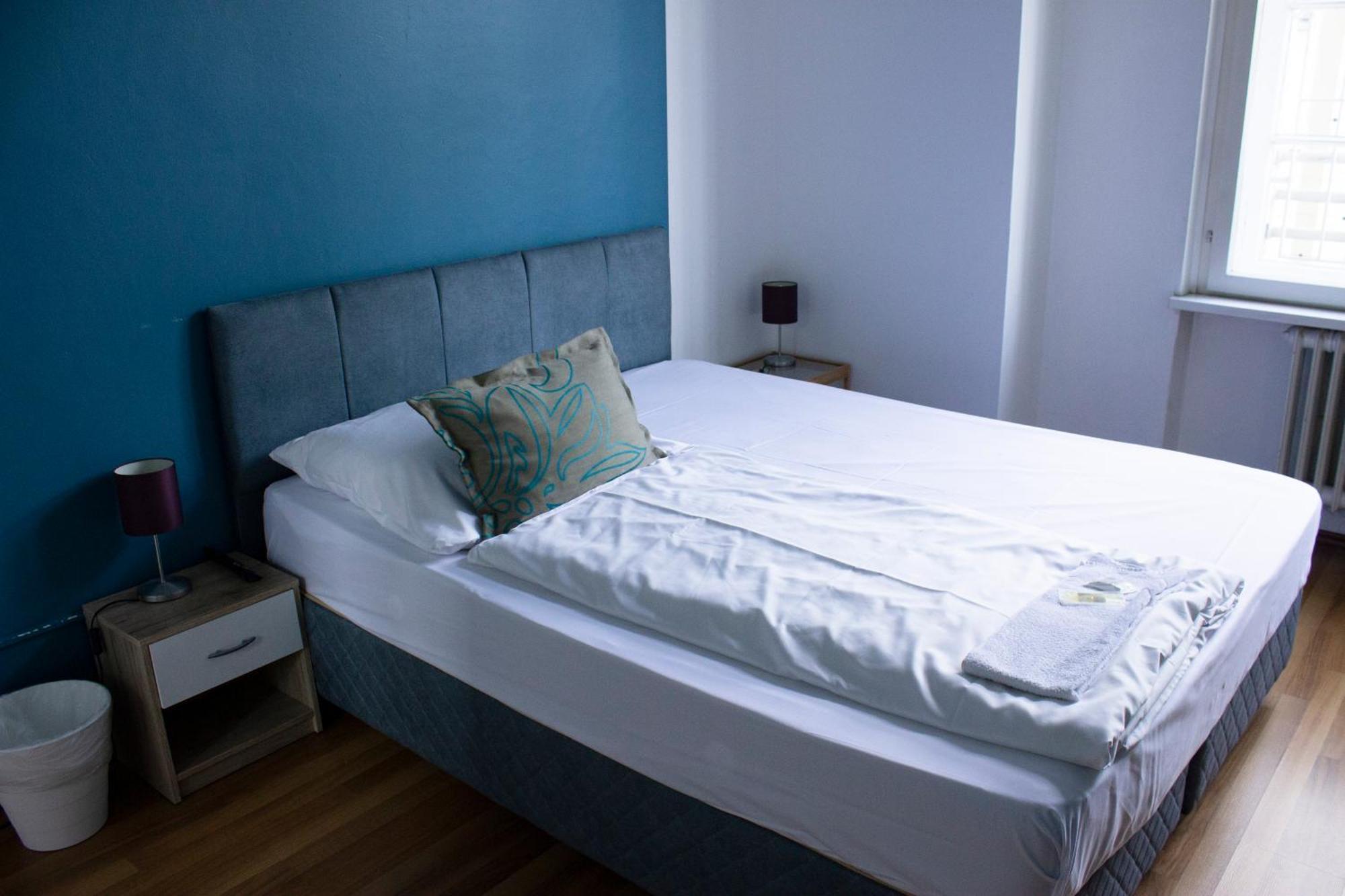 Vierpersoonskamer met Gedeelde Badkamer